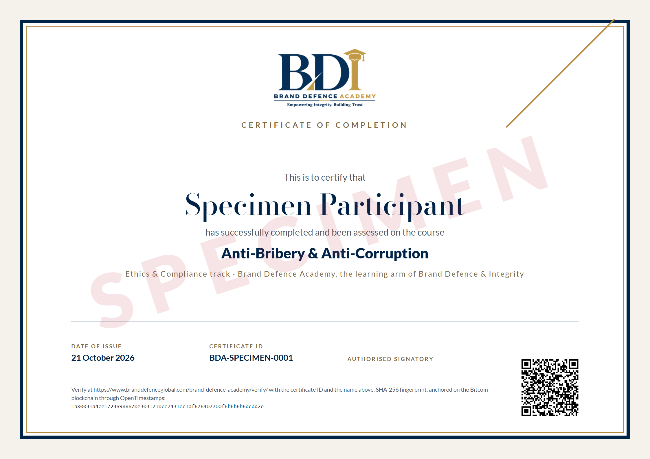 Specimen Brand Defence Academy certificate of completion for Anti-Bribery & Anti-Corruption, showing the participant's name, the course, the date of issue, certificate ID BDA-SPECIMEN-0001, a QR code to the verification page and the SHA-256 fingerprint anchored on the Bitcoin blockchain