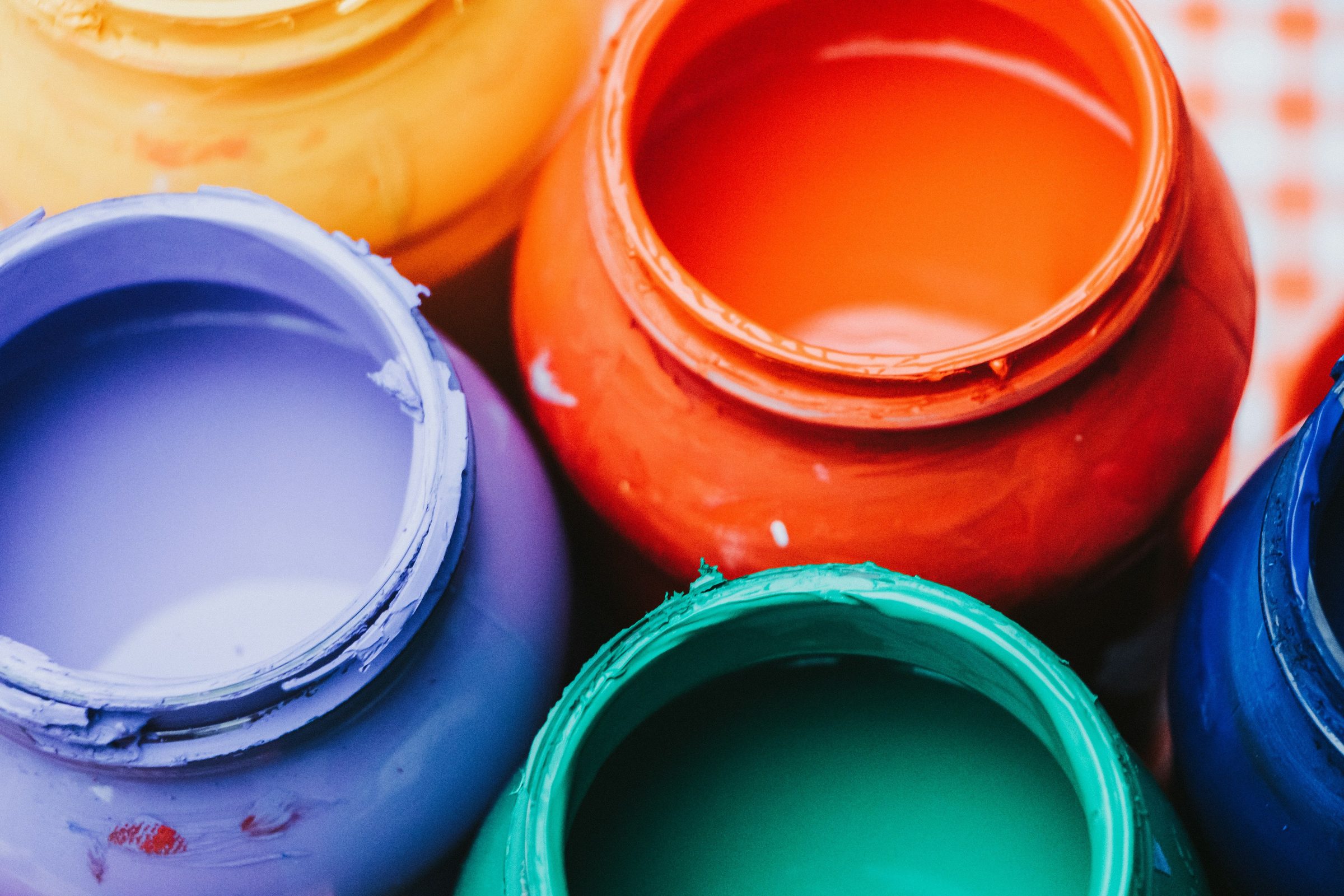 Close-up of paint cans. Photo: Ximena Balderas / Unsplash